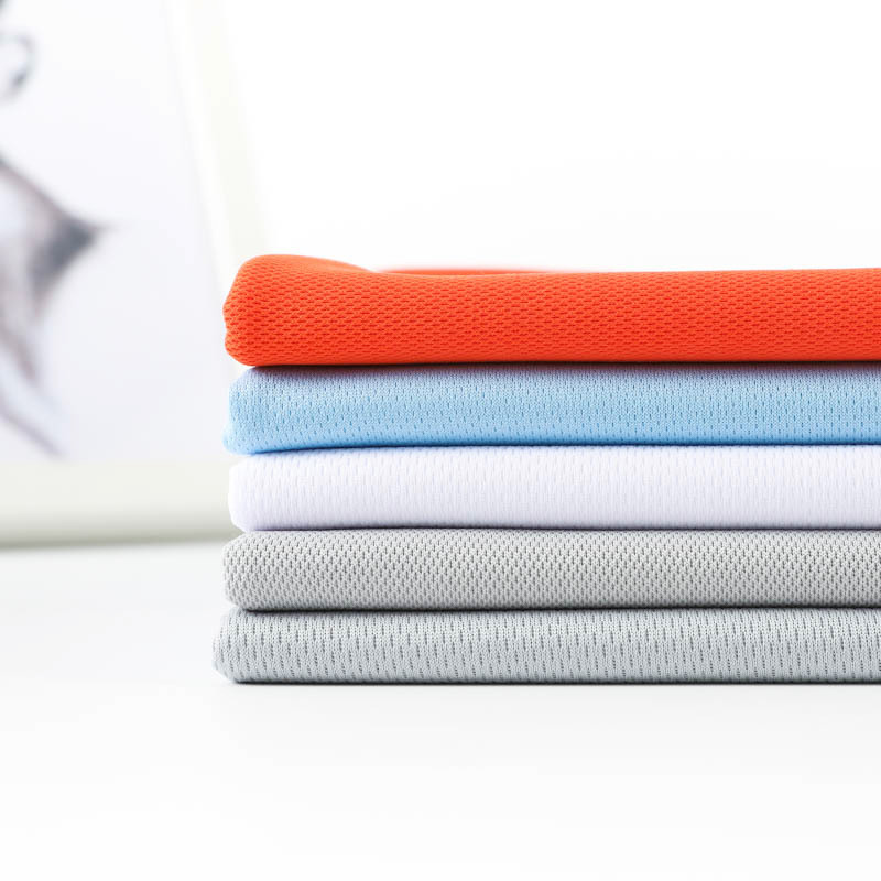 Toissijainen lintuperspektiivikangas, joka sopii urheiluvaatteisiin ja mainospaitoihin